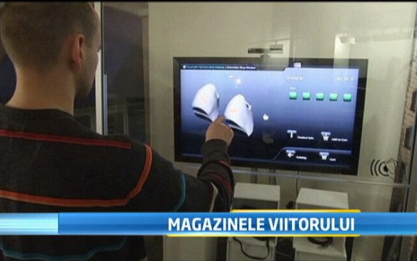 Vanzarile on-line aduse in strada. Vitrina care iti arata ce e in magazin, fara sa-i treci pragul