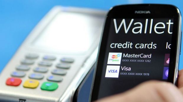 Telefon mobil in loc de card. Nokia aduce tehnologia NFC in Romania